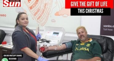 A nurse taking the donor’s blood.