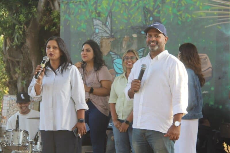 Lee-Ann and Pastor Malcolm Nair introducing the community.
