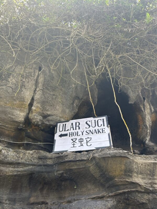 A sign showing the holy snake that guard the temple at the Tanah Lot Temple.