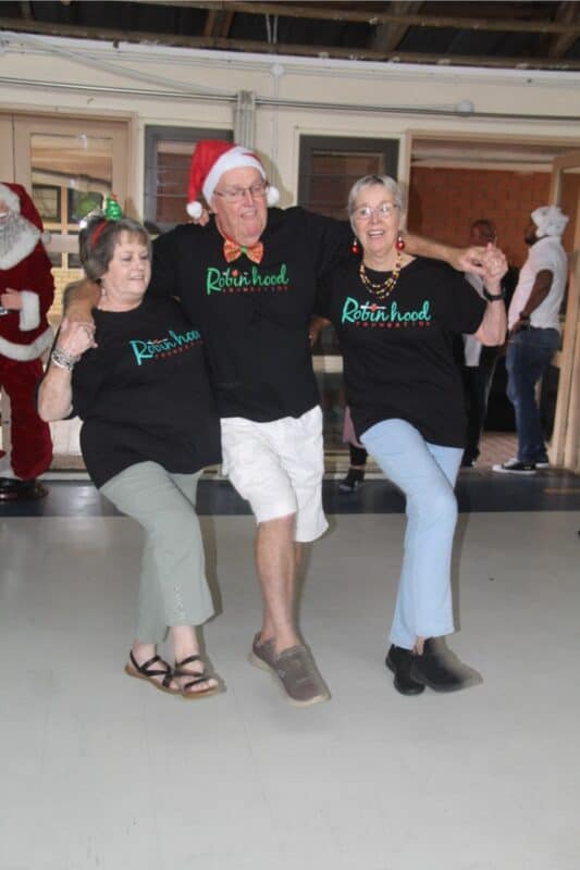 Suzie Stone, Brian Stone and Lily Parker doing the can can.