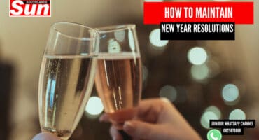 People clinking champagne glasses.