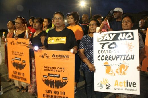 Ward committee member for safety, health and security in Merebank, Sharin Rajman took part in a a placard demonstration 