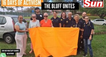Various The Bluff organisations got together to wrap The Bluff in orange for 16 Days of Activism.
