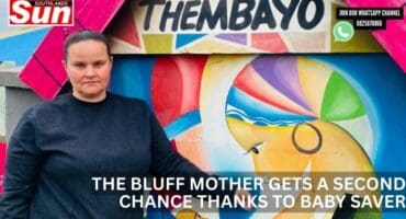 The director of the Isaiah 54 Children’s Home standing in front of their Themabyo baby saver.