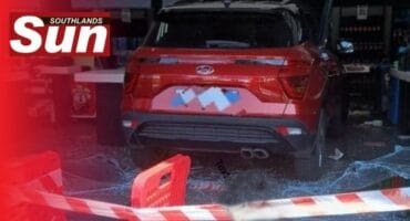 A car crashed through a store windows.