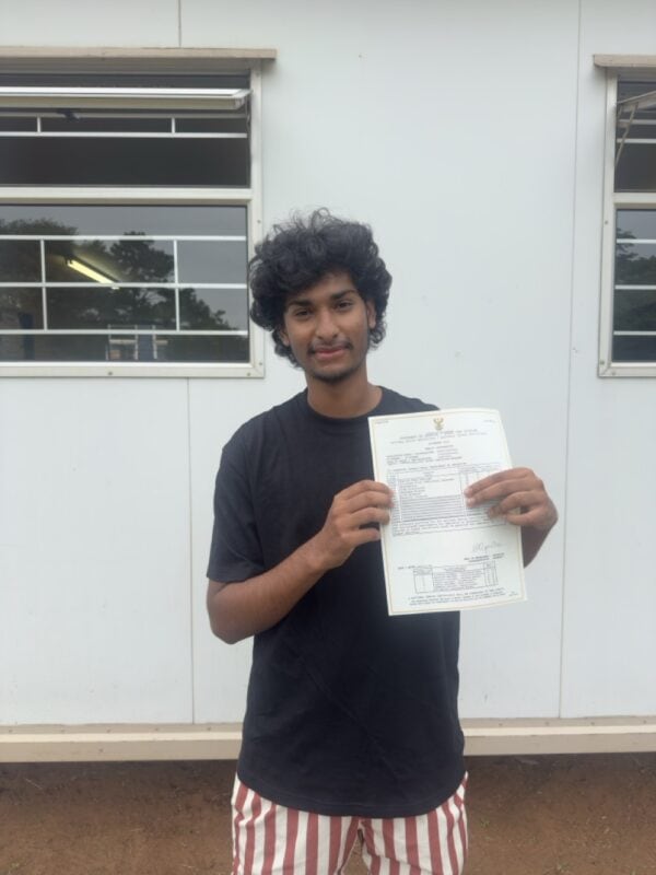 Bluff Christian Academy’s Enrico Chanderdutt was excited to finally get his statement of results.