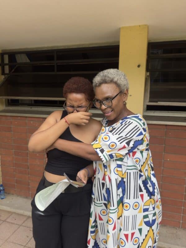 Grosvenor Girls High School’s Sphiwo Masuku was overcome with emotion to see her results alongside her IsiZulu teacher Liziwe Nonqane.