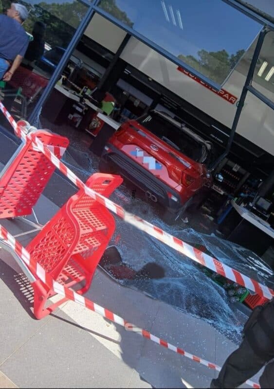 A car crashed through a store windows.