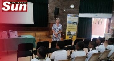 Yvette Taylor Director from Earth Organisation speaking to the children.