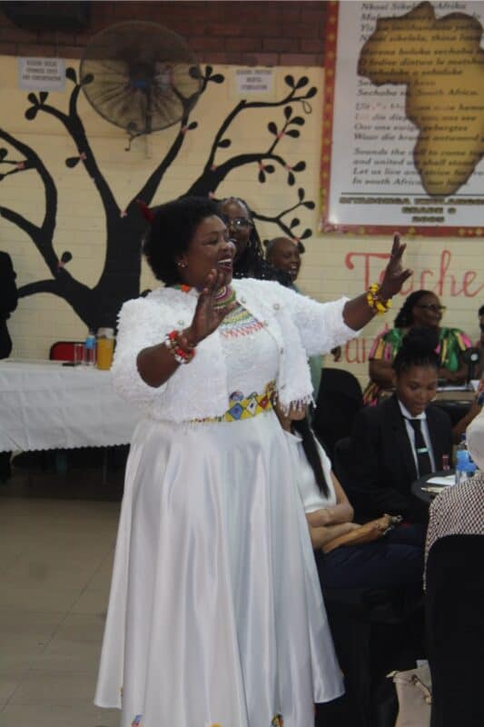 Samke Mdunge shows off her dance moves as they celebrate the learners.