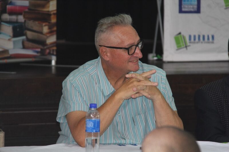 Ward 64 councillor Norman Gilbert enjoys the conversation.