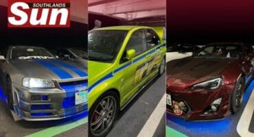 Some of the cars at the car meet.