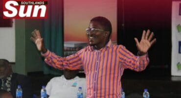 Safer Cities’ Marvin Qhobosheane plays a game with the boys.