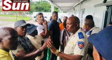 Owners of driving schools talking to the officials at the Rossburgh Licencing Centre.