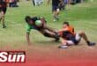 Harlequins’ Tyrese Jacobs tries to get as close to the try line while the Amanzimtoti Rugby Club's player tries to drag him.
