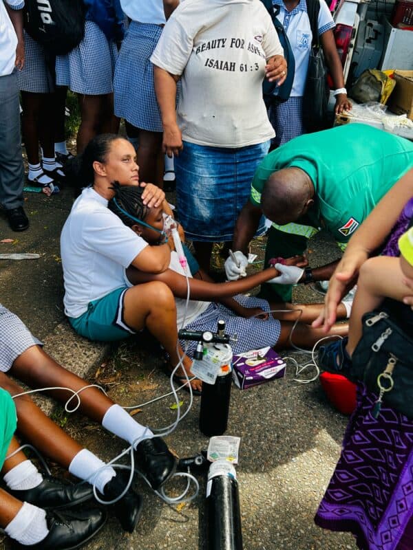 An Umbilo Secondary School learner being treated by the paramedics on scene. 