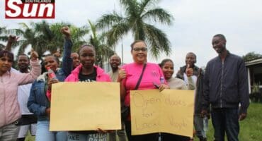 Tracey Williams joins fellow community members after handing over the memorandum at the Central Energy Fund