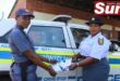 Sergeant Lettie Gasa and Constable Norah Ndlovu showcase the pamphlets distributed to the community during crime prevention operations