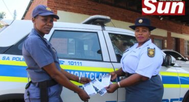 Sergeant Lettie Gasa and Constable Norah Ndlovu showcase the pamphlets distributed to the community during crime prevention operations