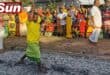 Yougen Pillay walks on the coals during the sacred festival held at the the Clairwood Shree Siva Soobramoniar temple.