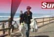 The Litterboom Project’s Mpilo Langelihle Mntambo clearing collected bags of dirt from Brighton Beach.