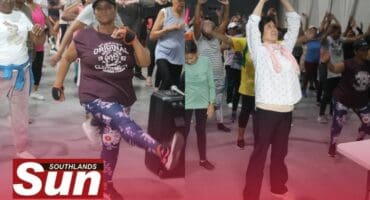 Alicia Gaskell and University of Boulder professor Jia Shi take part in the fitness fun.