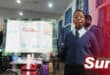 Aphelele Ntinga poses with his poster and model Hydropower plant.