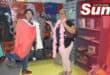 Zina Nazer and Yess co-founder Linda James pick out pieces they like at the new thrift shop.
