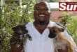 Inspector Sabelo Ngcobo of the Durban and Coast SPCA with two of six puppies rescued from a burning scrapyard in Clairwood.