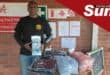 Wasp’s Brian Naidoo with some of the donated clothing handed out to St Monica’s Children’s Home.