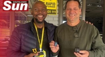 Xolani Zondi, founder of Bluff Academy, with chairperson of junior football at Fynnland Sports Club Paul Aver.