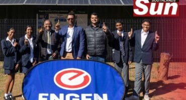 Kishan Bridgelal, principal at Merebank Secondary School with Krishna Govender RTT Manager, Kevin Singh, Engen Head of EBES and learners from Merebank Secondary
