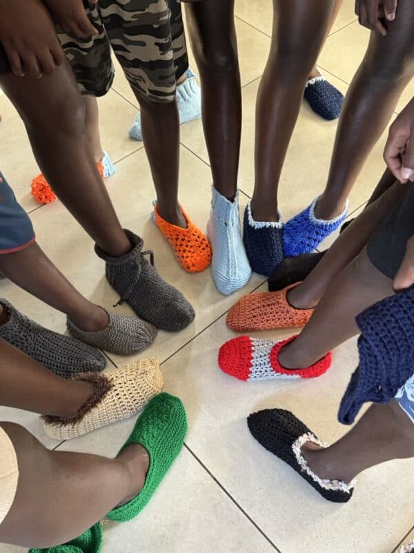 The boys at iCare show off their new booties.