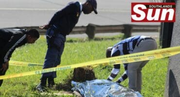 Police gather evidence at a scene where a man was shot dead in Quality Street in Wentworth