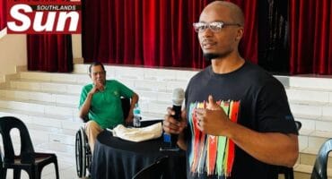 Air quality and health officer from South Durban Community Environmental Alliance, Bongani Mthembu addresses the community.