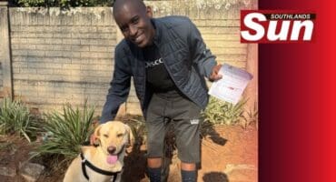 Rollo the dog and Sandile Radebe at the previous State free rabies vaccination drive in Montclair.