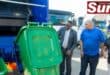 Mayor of eThekwini Municipality, Cyril Xaba stands alongside municipal officials during the unveiling of the City's new waste management fleet.