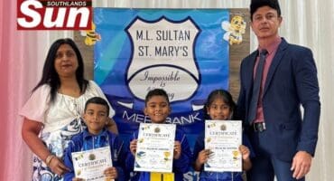 Departmental head Lavina Sewsunker and acting principal Ramesh Singh with the winners of the spelling bee Jeremiah Phillips, Kade Ganesh and Elliana Valayathum.