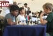Rajaram Keher (left) with his teammate, put their chess skills to the test at a recent tournament held in Yellowwood Park.
