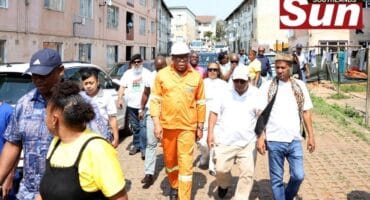 Mayor of eThekwini Municipality Cyril Xaba flanked by ward 68 councillor Aubrey Snyman and Chief Mervyn Damos during his visit in Wentworth.
