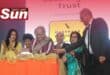 Ela Ghandi, with the support of professor Managay Reddi and the rest of the Merebank Book Project committee, cut the cake to celebrate the launch of the book.