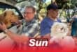 Wayne Ormshaw and Gilbert Kiewiets with their pets Buddy and Waffles.