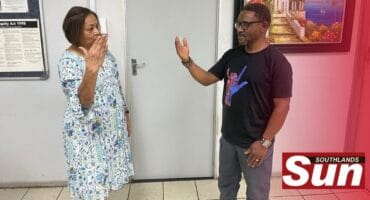 Nayantra Khanye signs hello to Welcome Khumalo.