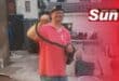 The Bluff based snake catcher Warren Dick with the captured black mamba.