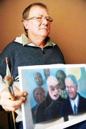 Kobus Myburgh displays the painting titled Simunye.