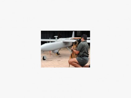SANParks personnel inspect the UAV or drone that was tested in the park for use in anti-poaching. Photo: SANParks