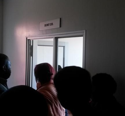 Protesters sang their way to Nyathi's office, where they waited to be heard.