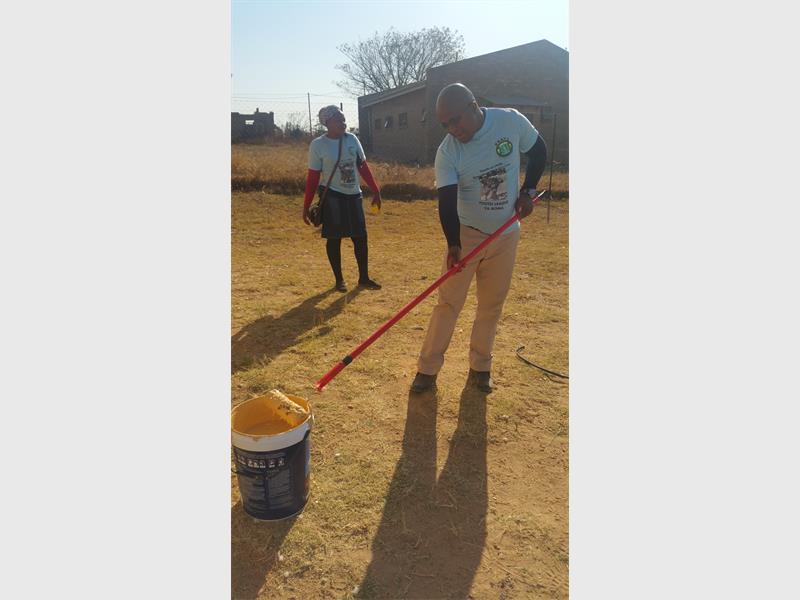 BRA party leader Cleopas Maunye helped paint Hluvula Busiwana crèche.