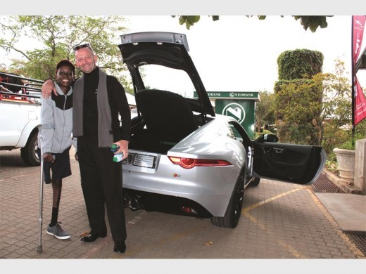 Bongani Khubayi and the sales manager of Jaguar Nelspruit, Clinton Laurens, after their ride in the Jaguar F-Type.