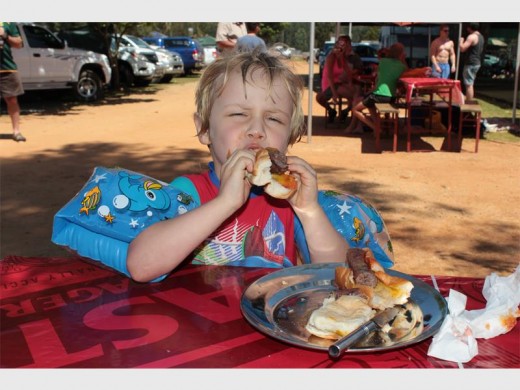 Luke Darwell enjoys a hot dog